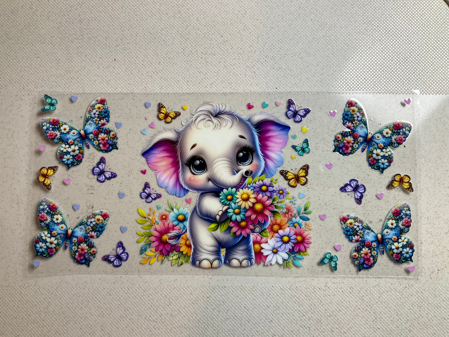 A- Elephant with butterflies